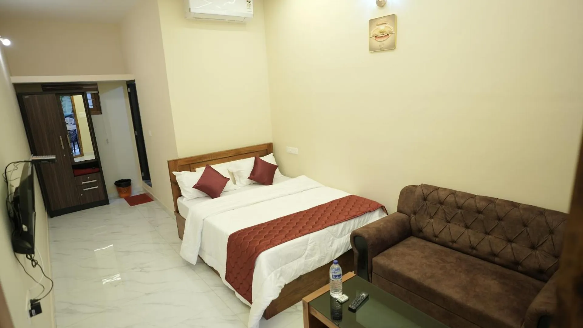 **  Amal Residency- Airport Hotel Kannur Kottayam-Malabar Indie